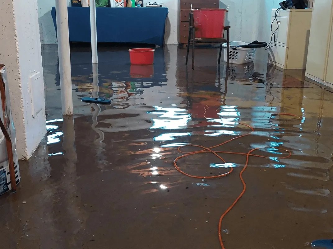 Basement with boiler, cabinets and washing machine completely flooded in Huntsville, AL